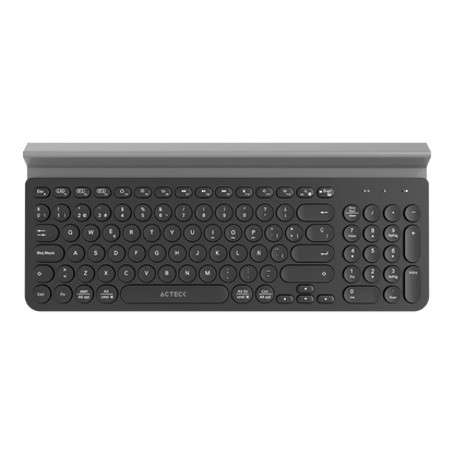 Teclado Acteck Inspire Comp TI695 — Inalámbrico Dual, multidispositivo, con 97 teclas y distribución en español, teclas multifunción y ranura para dispositivos, color negro.
